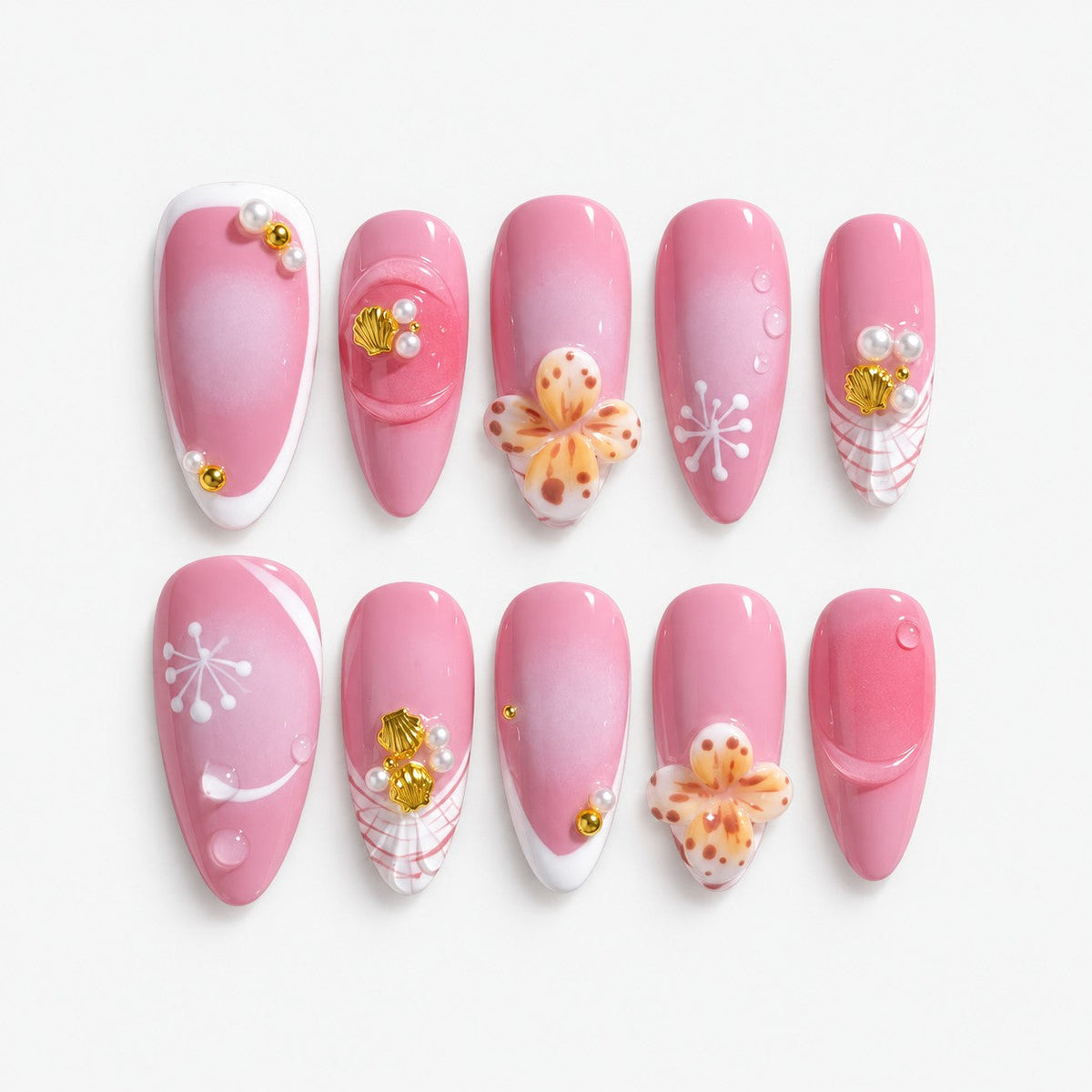catalog: Almond medium press-on nails in rose pink with white tips, sculpted cream and apricot flowers, gold shell charms and pearls.