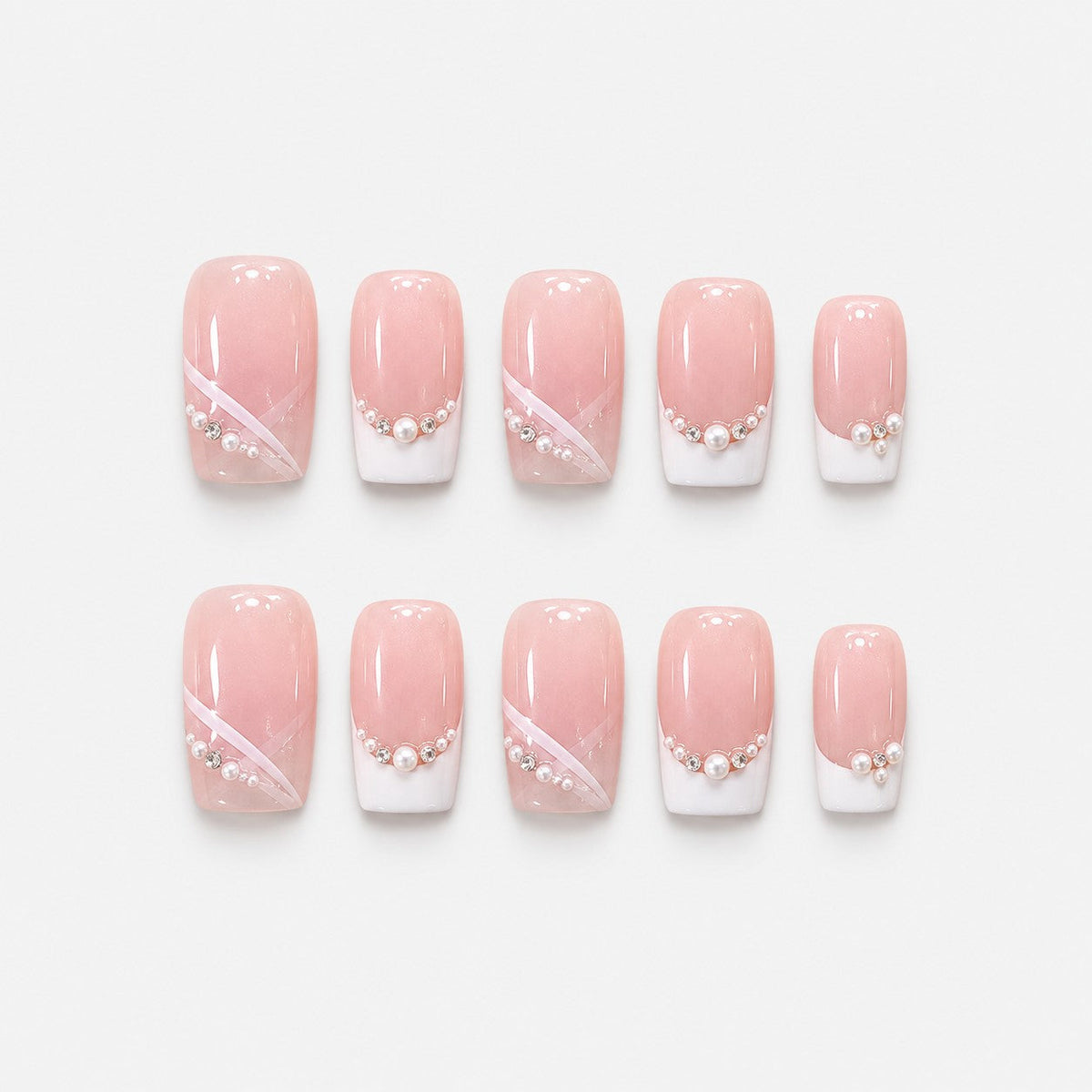 catalog: Medium square press-on nails in sheer pink with white French tips, small pearls and clear crystals along the smile line.