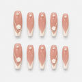 catalog: Long almond press-on nails with sheer blush base, soft white French tips, a sculpted white camellia flower, a silver chain and single pearls.