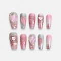 catalog: Long coffin press-on nails in smoky grey and dusty rose with silver chains, raised pink hearts and clear crystals.