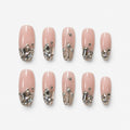 catalog: Long square press-on nails with a bare clear base and dense clusters of clear crystals across the tips.