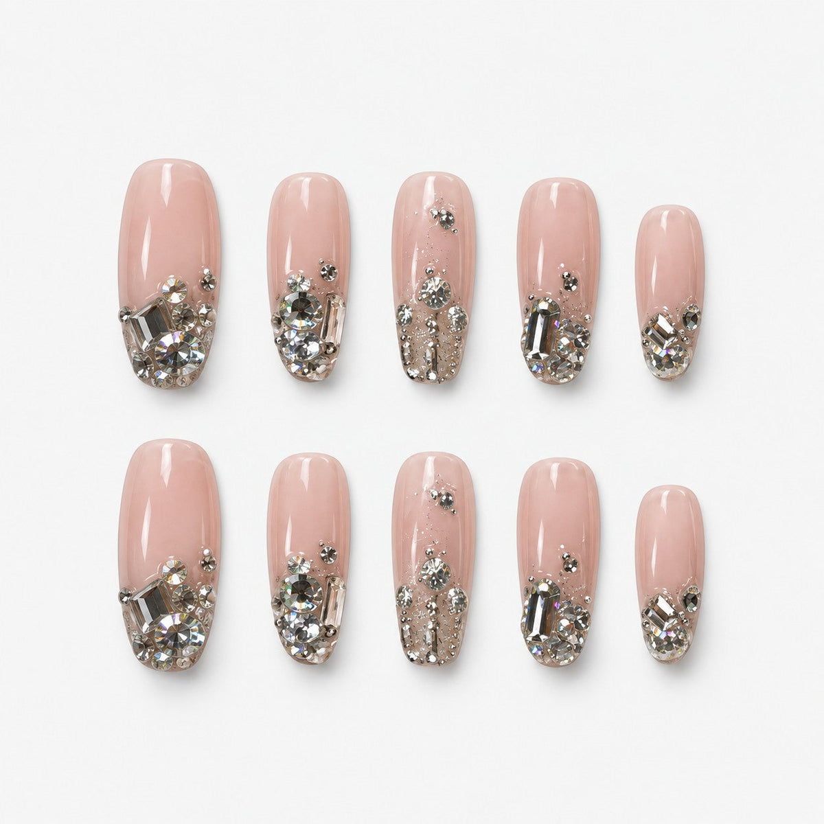 catalog: Long square press-on nails with a bare clear base and dense clusters of clear crystals across the tips.