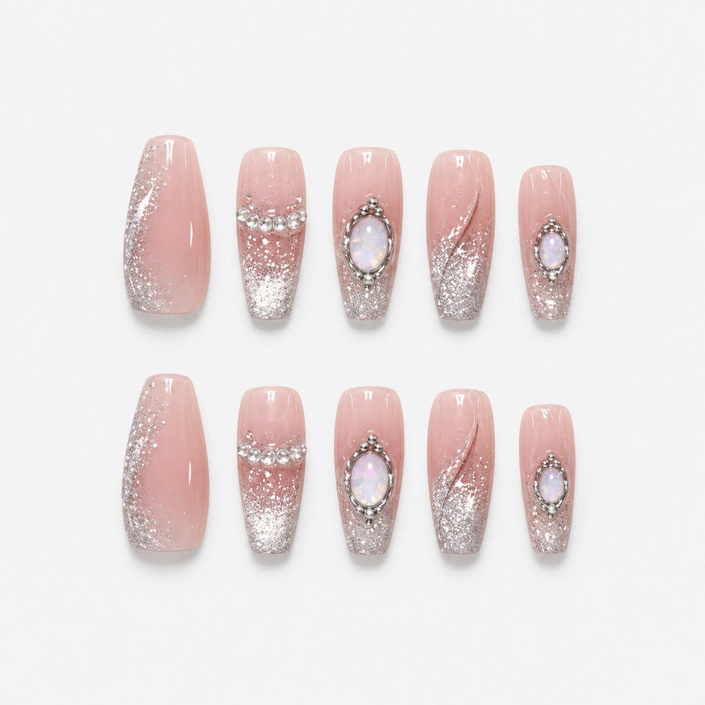 catalog: Long coffin press-on nails in sheer pink nude with silver glitter and opal stones set in fine silver outlines.