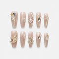 catalog: Long clear coffin nails with silvery glitter, raised cream pearls and clear faceted crystal stones.