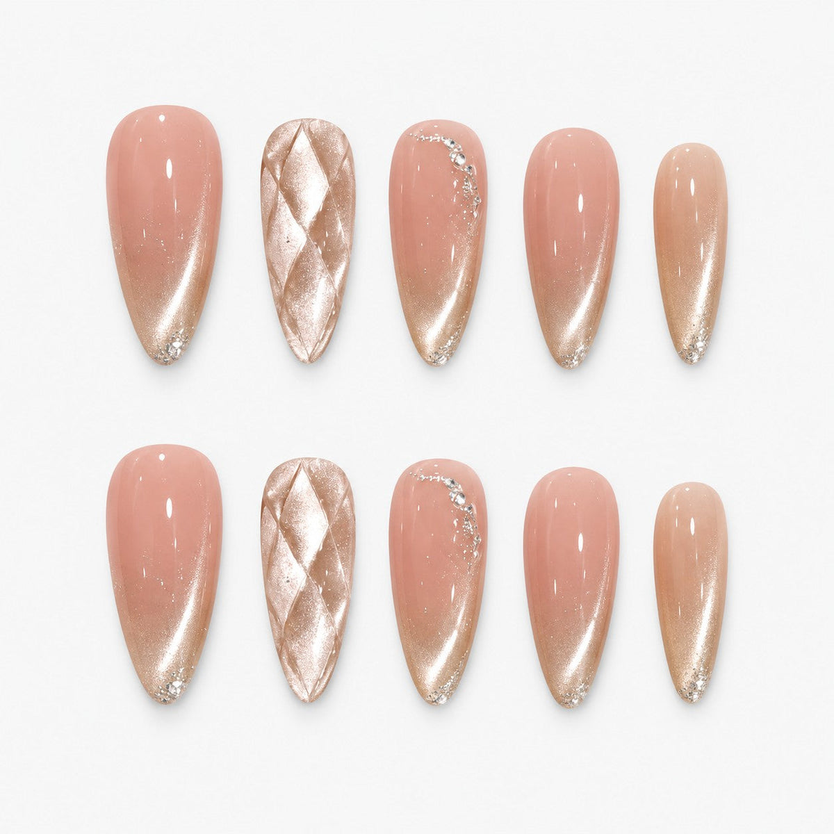 catalog: Long almond press-on nails in nude pink fading to mirror champagne gold, one with a quilted diamond texture, plus glitter and small crystals.