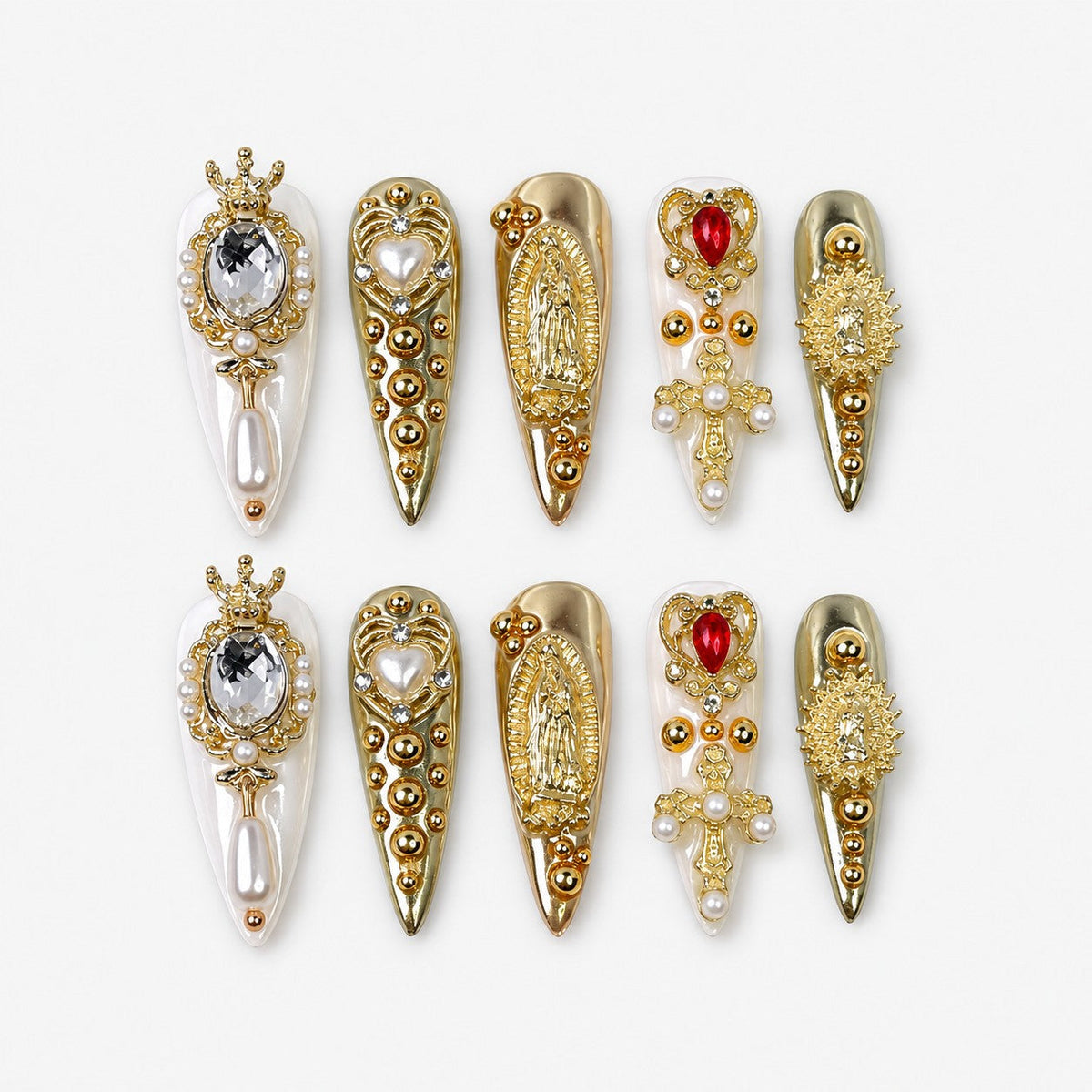 catalog: Long stiletto press-on nails in mirror gold and pearl white with a crown charm, pearl drop, red teardrop crystal and ornate gold filigree.
