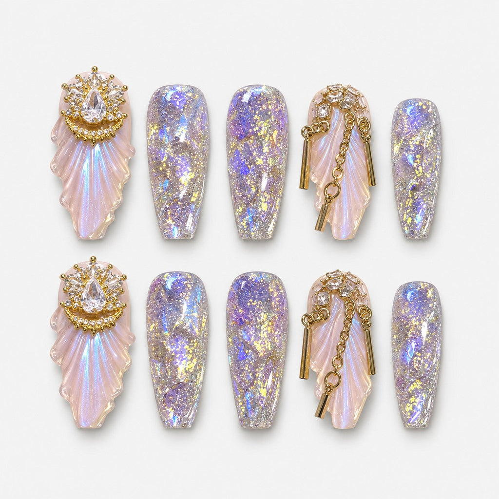 catalog: Long coffin press-on nails with opal glitter, sculpted pearly shell wings, gold chains and gold crystal crowns.