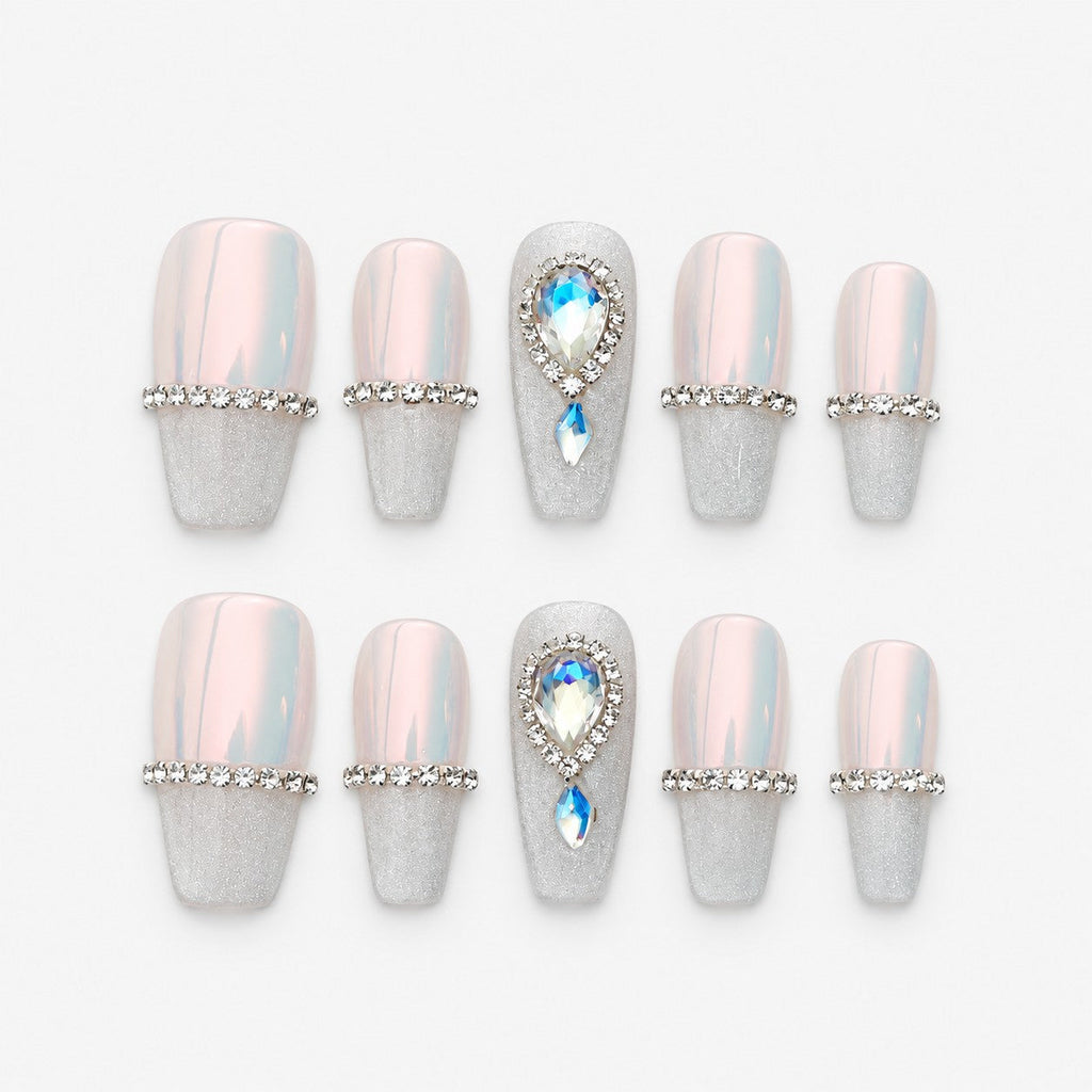 catalog: Medium coffin nails in pink opal chrome with a rhinestone band, frosted silver glitter tips and teardrop crystal accents.