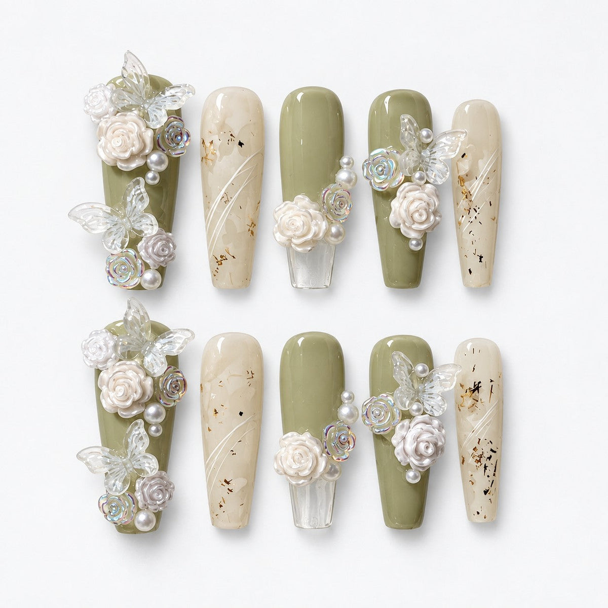 catalog: Long coffin press-on nails in sage green and milky white with hand-sculpted white roses, pearls and sheer butterflies, plus clear nails holding dried flower flecks.