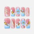 catalog: Medium square press-on nails in pink to blue gradient with sculpted white and blue flowers, gold shell charms, pearls and gold leaf marbling.