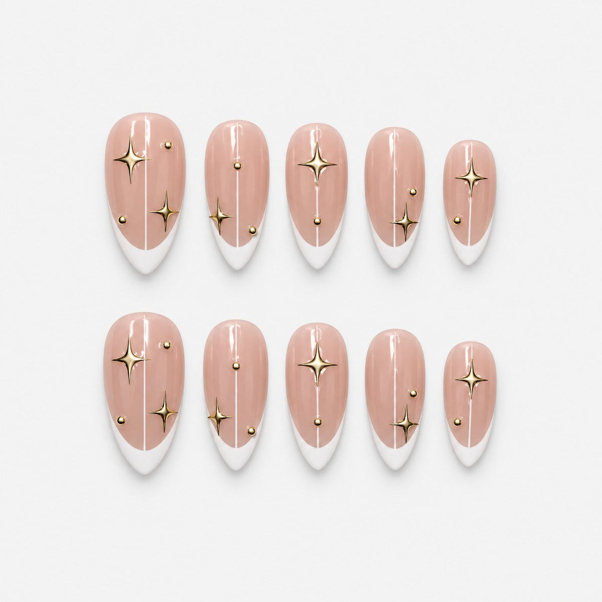 catalog: Medium almond press-on nails with white French tips on a sheer pink base, gold star decals, thin gold lines and small gold studs.