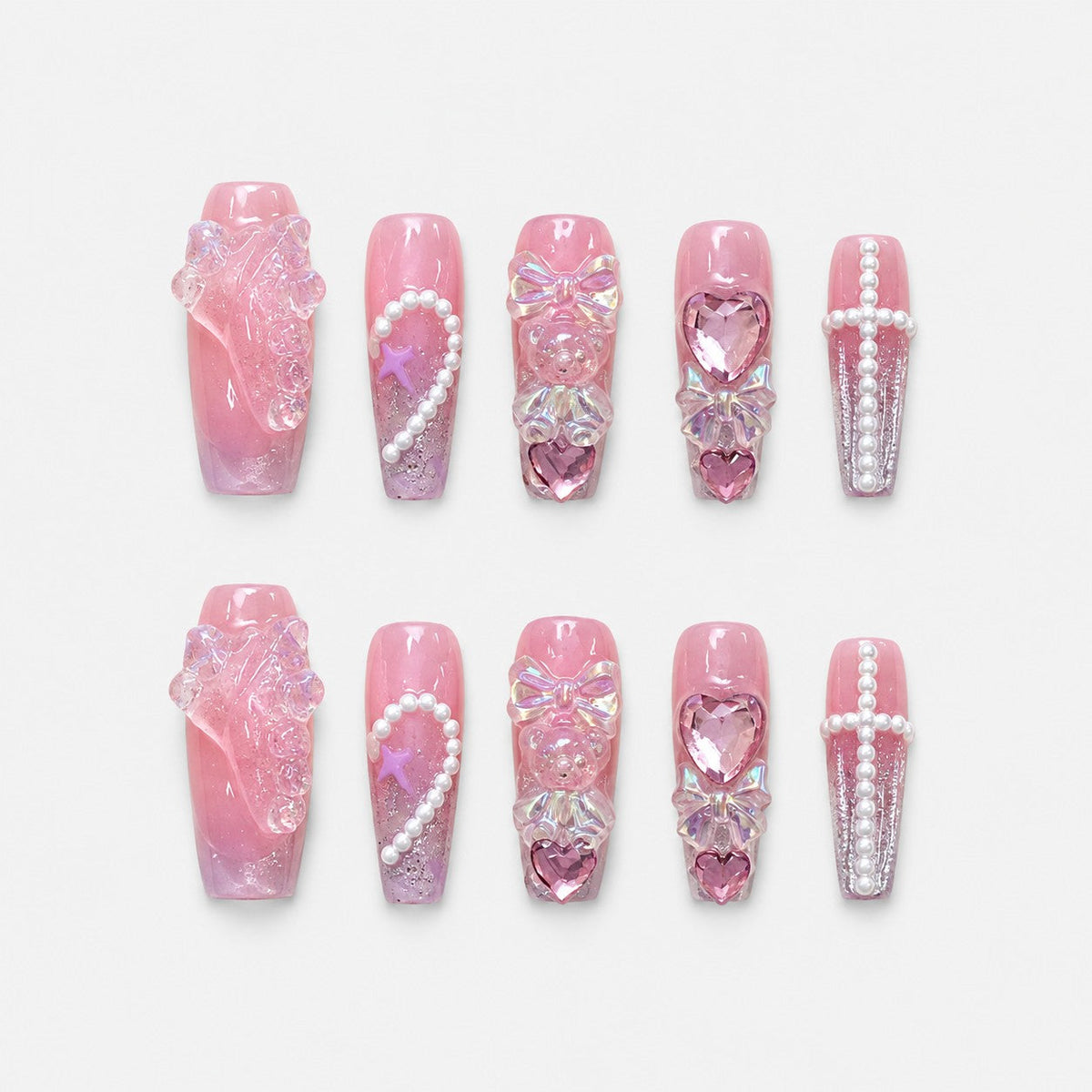 catalog: Long pink coffin nails with iridescent 3D bows, bear charms, glassy hearts and curved pearl strands.