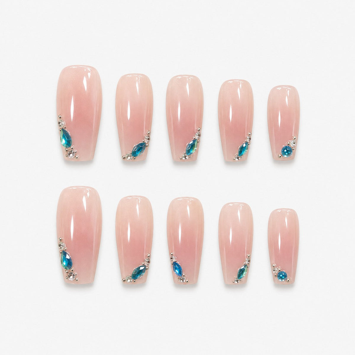 catalog: Long almond nails in milky pink with glossy finish and blue teardrop gems set in silver along the tips.